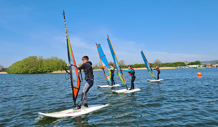 Windsurfers on the water in RYA NE region.