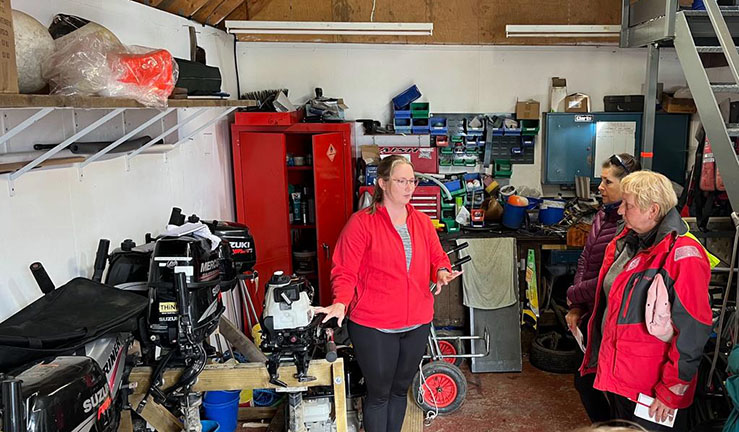 As part of the RYA Midlands Aspiring Female Powerboat Instructor programme, Natalie Smith leads a session in the boat shed on engine maintenance.