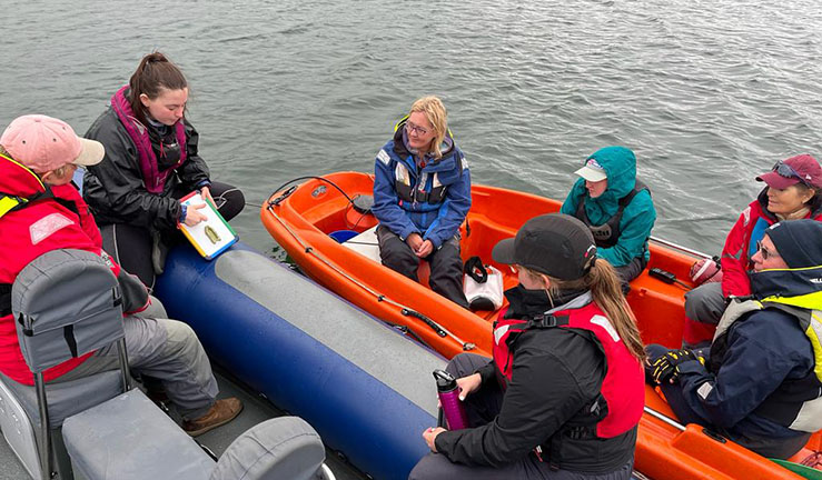 Seven women sat on two RIBs with one leading a session as part of the RYA Midlands Aspiring Female Powerboat Instructor programme.