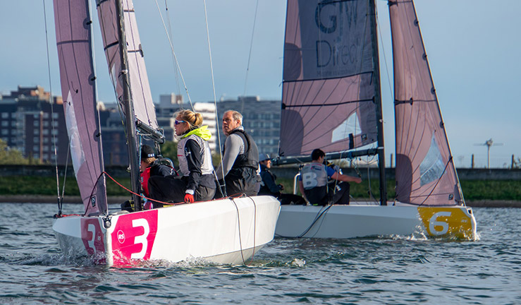 Two teams aboard RS21s racing upwind at RYA National Match Racing Championships 2023 at Queen Mary SC.