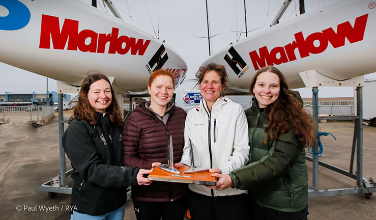 Group picture of Alison Morrish's winning team with the trophy after winning the RYA Marlow Ropes Women's Match Racing Championship at WPNSA 2023