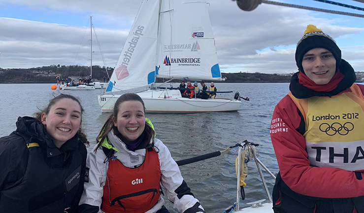 Students sailors on small keelboats racing on the Firth of Forth.