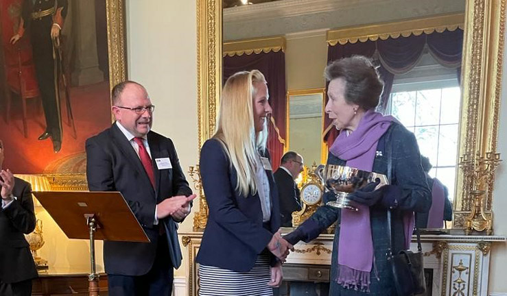 Harriet Steptoe is presented with the RYA Yachtmaster of the Year 2021 award by HRH The Princess Royal and Richard Falk, Director of RYA Training and Qualifications.