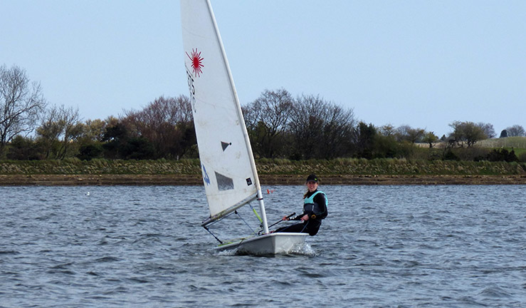 ILCA sailor Jess Pound on the water at Scaling Dam SC.