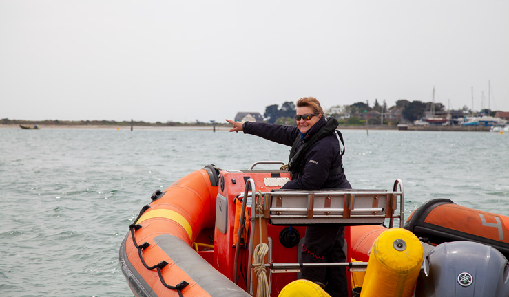 Woman helming safety boat