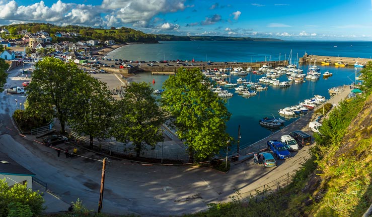 Wide shot blue waters of Carmarthen Bay