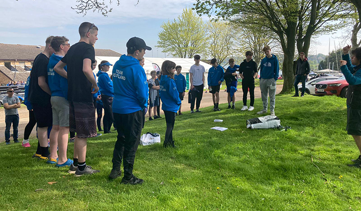 team Scotland junior sailors dressed in blue by Rutland Water