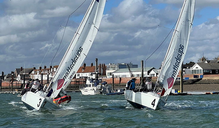 Two teams match racing along the shore in 707 keelboats at Burnham-on-Crouch. 
