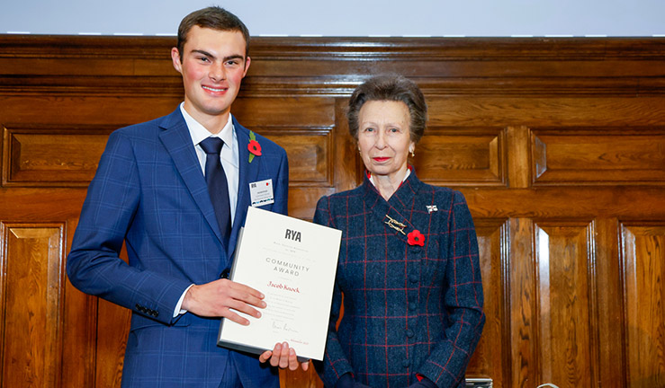 Jacob Knock is presented with an RYA Volunteer Award by HRH The Princess Royal. 