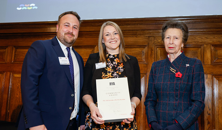 Jamie and Nicky Kerslake are presented with an RYA Volunteer Award by HRH The Princess Royal. 
