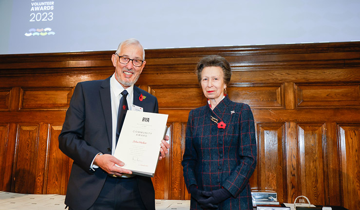 John Mellor is presented with an RYA Volunteer Award by HRH The Princess Royal. 