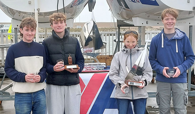 Second places team with trophies on shore at WPNSA at RYA Schools Match Racing Championship 2023 - 3 boys + skipper Ruby who won the inaugural first female helm trophy.