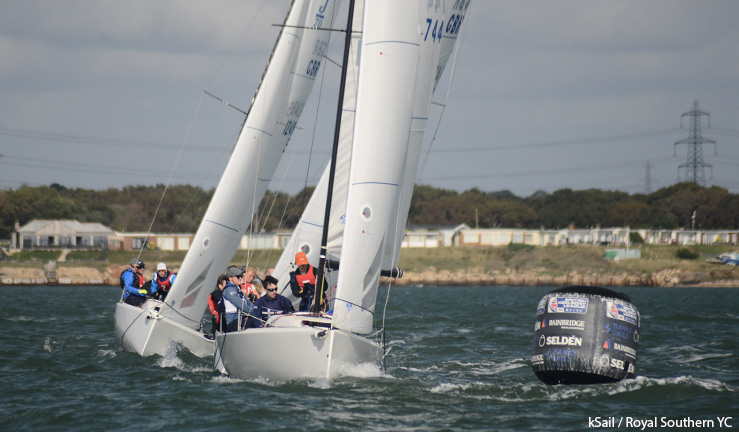 Three teams rounding a mark in J70s with breeze and sunshine at the British Keelboat League final 2023.