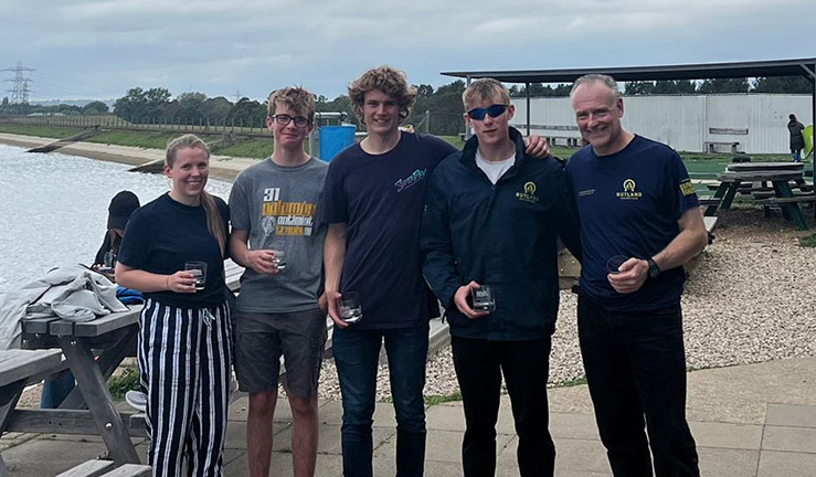 Winning skipper Ben Tylecote with his team from Rutland Sailing Club on shore at Queen Mary SC after winning RYA Summer Match Racing Q2 2023.