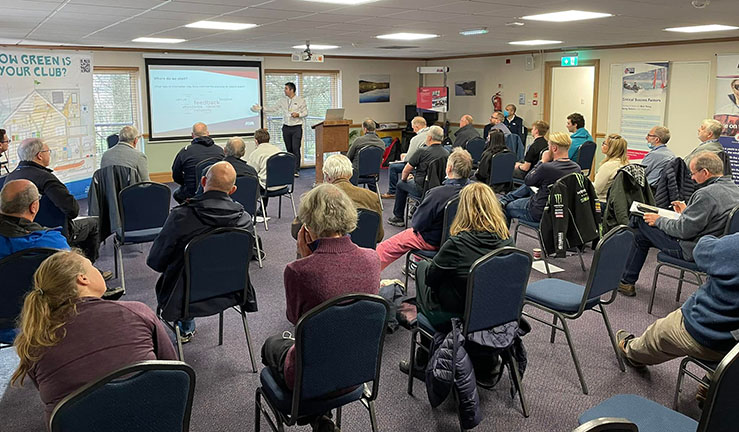 Conference room full of people listening to a presentation at previous North West RYA Affiliated Clubs Conference.