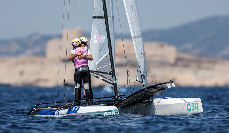john gimson and anna burnet embrace after devastating final day on the water