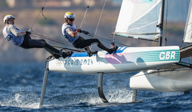 john gimson and anna burnet racing the foiling nacra 17 at the paris 2024 olympic games