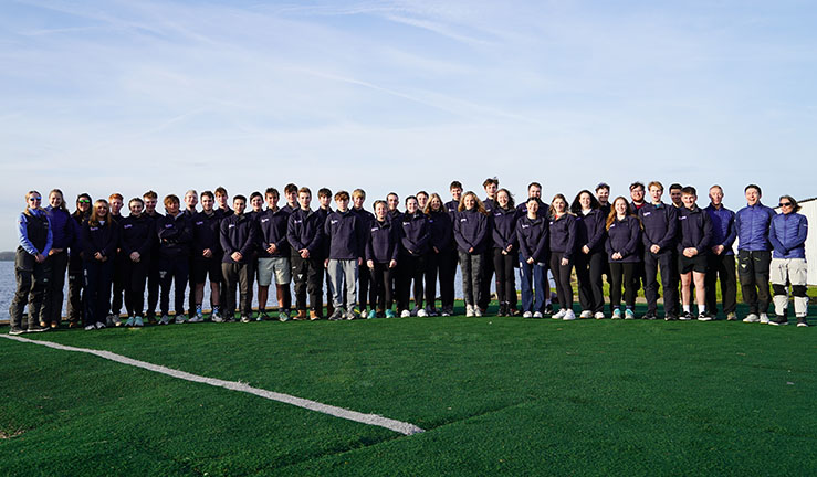 Group picture of British Keelboat Academy squad 2024 comprising around 40 sailors and coaches.