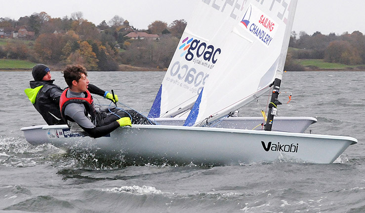 Two youth sailors battling it out upwind in ILCAs at Draycote Water.