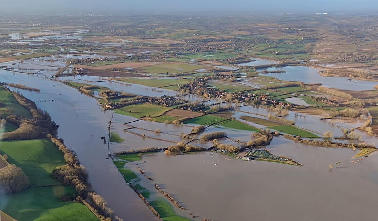 Picture of flooding taken from a glider, showing Notts County Sailing Club and boatpark as an 'island' surrounded by countryside and fields under water.