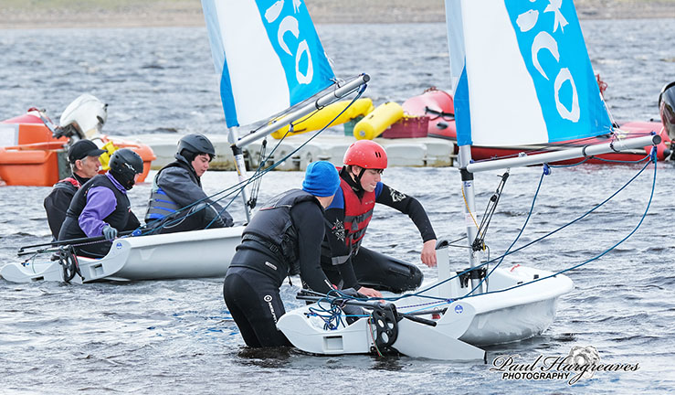 Two instructors helping to launch Pico dinghies at Yorkshire Dales YC.