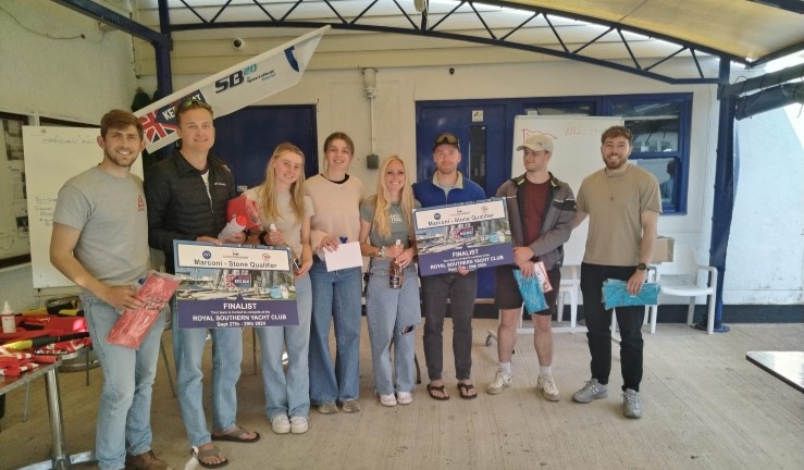 BKL prizegiving picture at Stone SC of the first and second placed teams from Q4 - Royal Thames YC and Burnham SC - holding their giant 'tickets' to the BKL finals at Royal Southern YC in September 2024.