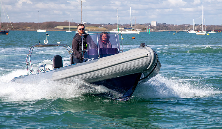 RIB with two passengers on board