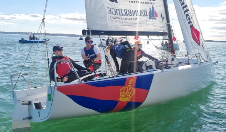 The Royal Thames YC Academy team aboard a Royal Southern YC branded J70 on a sunny Saturday at the British Keelboat League 2024 final.  