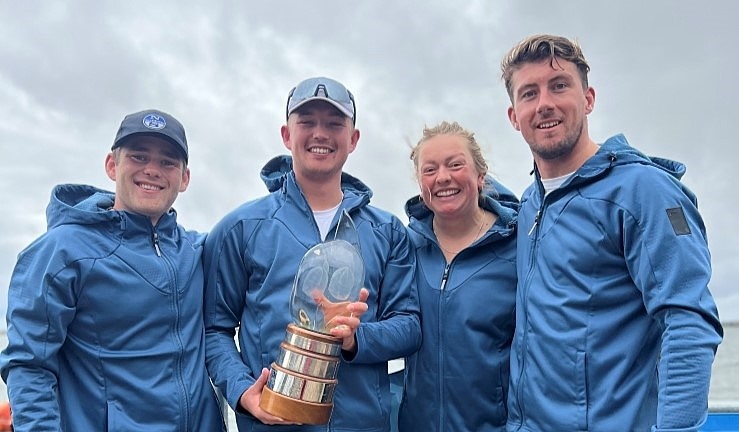 Ted Blowers with his team holding the trophy RYA National Match Racing Championship trophy after winning the Grand Finals 2024 at QMSC. 
