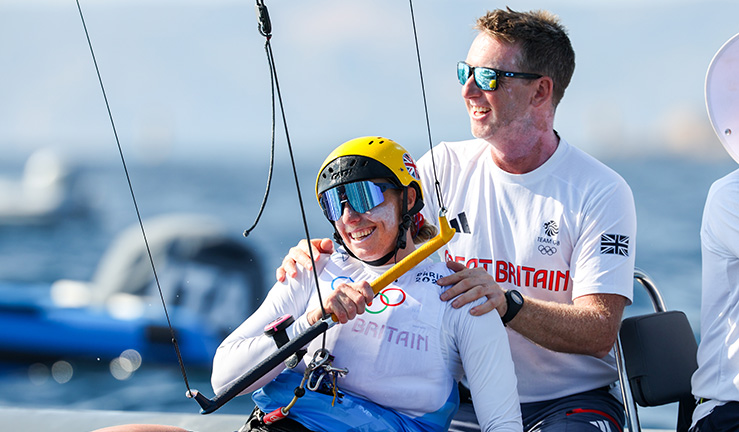 Kite foiling gold medallist Ellie Aldridge with coach Stevie Morrison