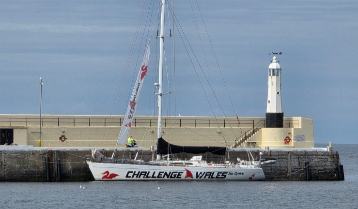 The Challenge Wales sail training ship on sunny day at anchor at Peel on the Isle of Man.