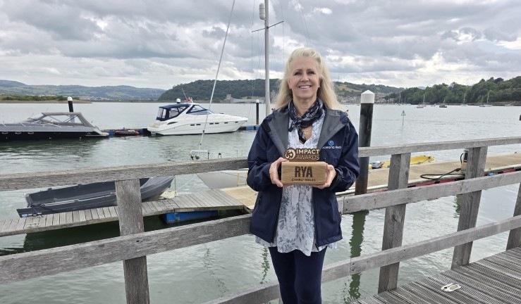 All Afloat charity trustee Petrina Blomeley by the water in North Wales with her RYA CW Impact Award.