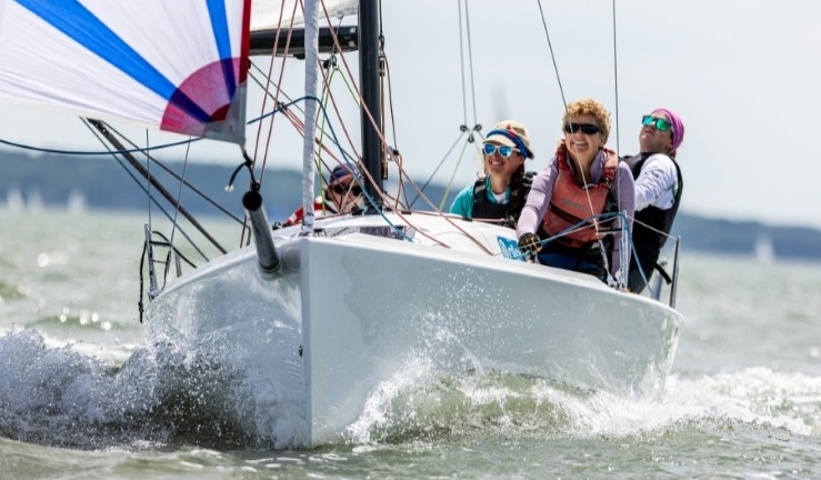Team Lymo smiling in the sunshine with kite flying in J70 at the British Keelboat League Women's Qualifier 2025.