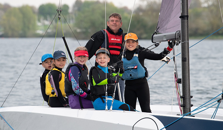 Children having fun on a keelboat