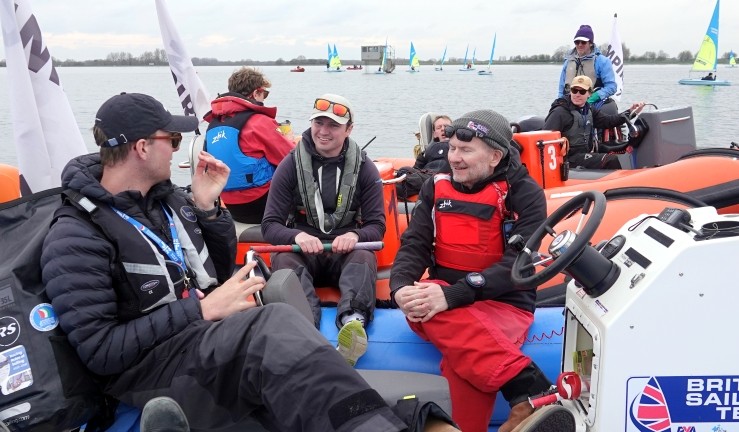 Group picture of volunteers and race officials aboard powerboats at the RYA/UKTRA National Team Racing Championship 2025. 
