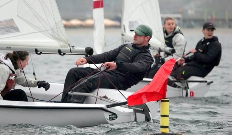 Close racing between two teams in Firefly dinghies at RYA/UKTRA National Team Racing Championship 2025. 