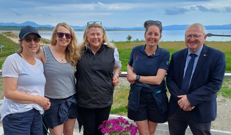 RYA CW Chair Sian Reynolds at Pwllheli with three fellow  #GlobalWomensWalk2025 participants and Stephen Tudor of Plas Heli.