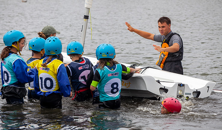 Instructor working with OnBoard children