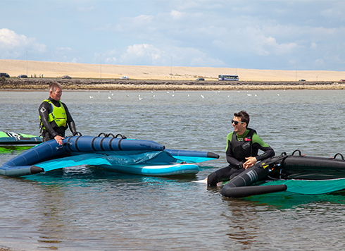 Men with wingsurfing kit 