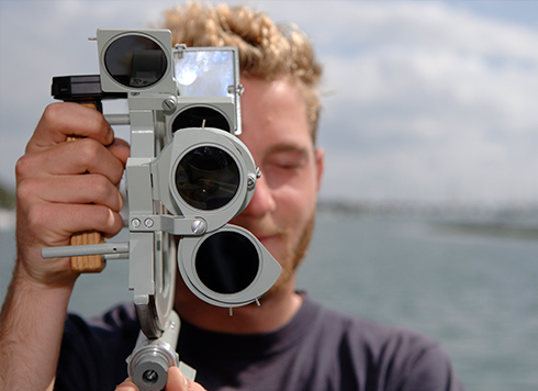 Man using sextant