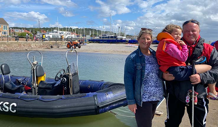 Dave Kelly with his wife Eva and his daughter Silke after completing the course