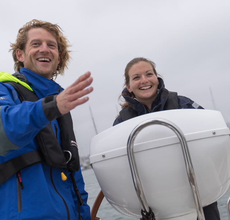Matt Sillars and female trainee on helm