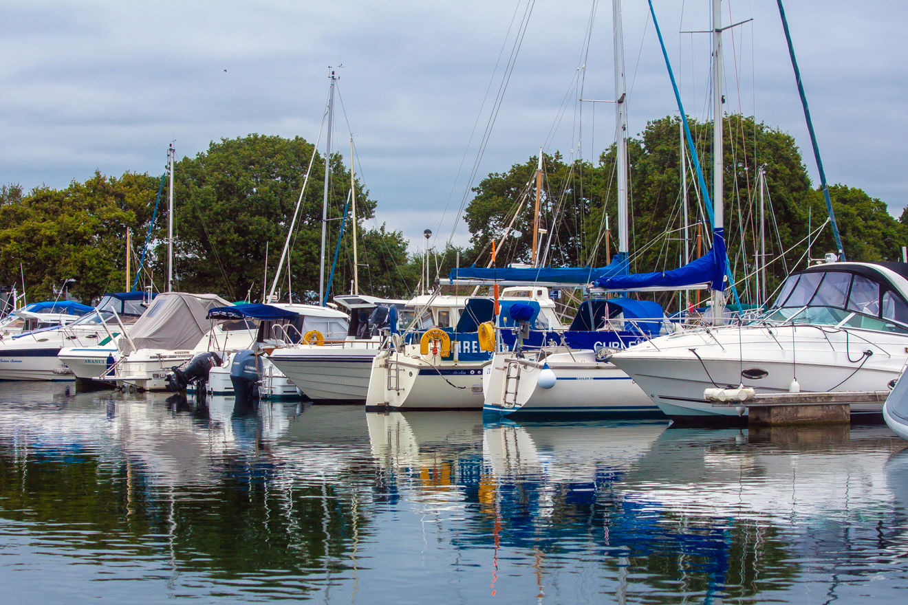 Boats moored next to each other 