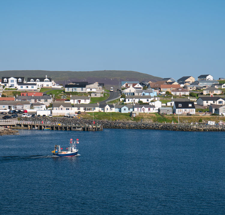 The coastal community of Hamnavoe on the west of Mainland, Shetland, Scotland, UK 