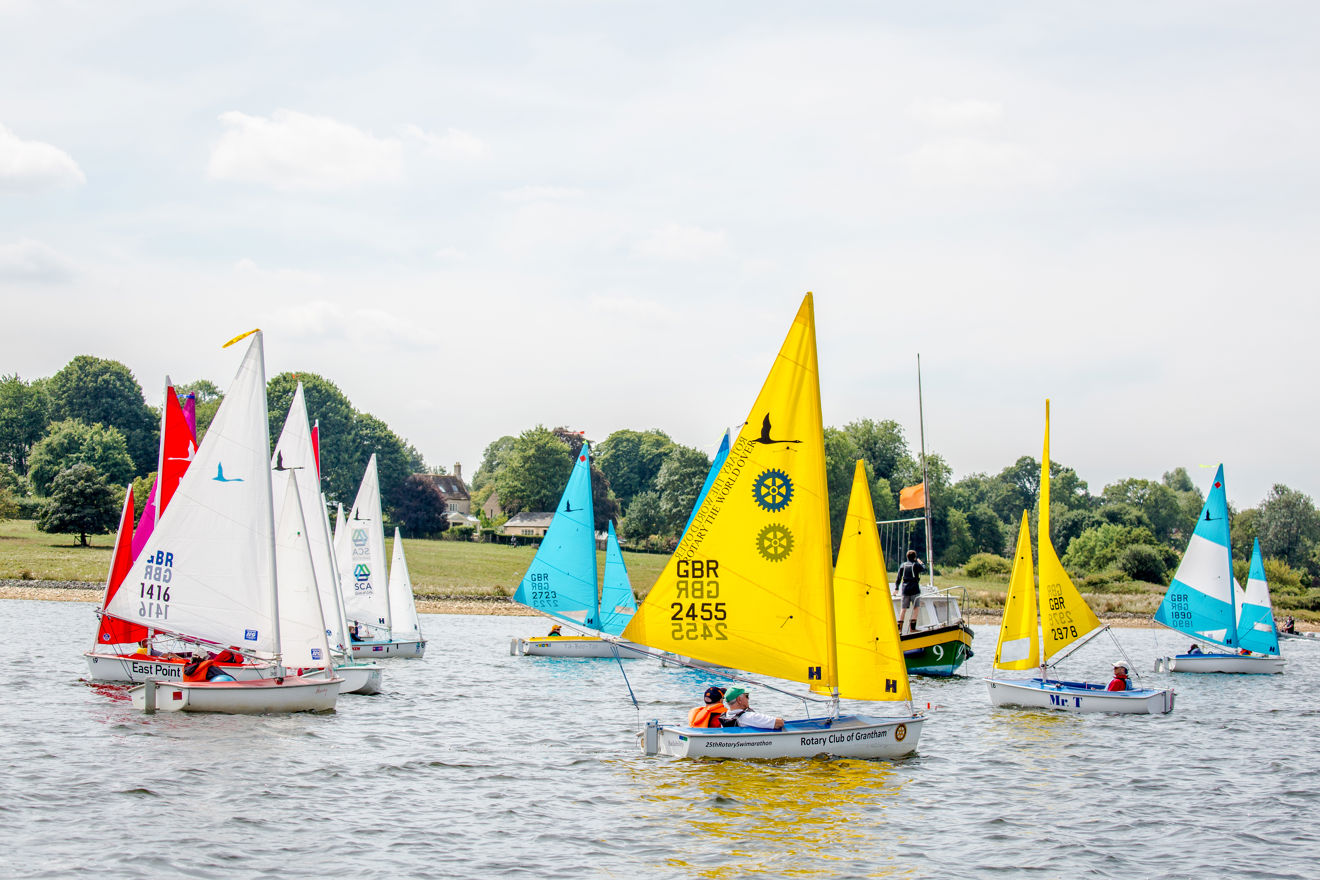 Mid shot of colourful boats on the water