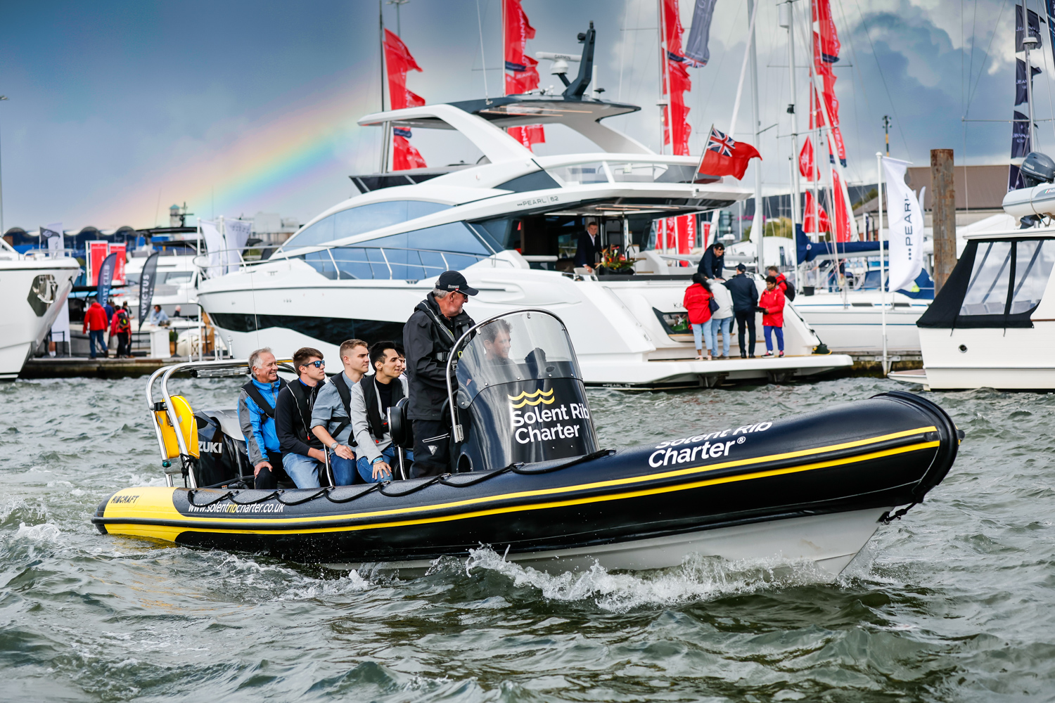 	RIB ride at Southampton Boat Show with rainbow in the background