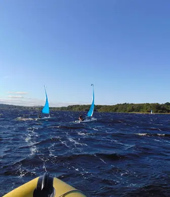 Two Pico dinghies sailing as seen from the safety boat