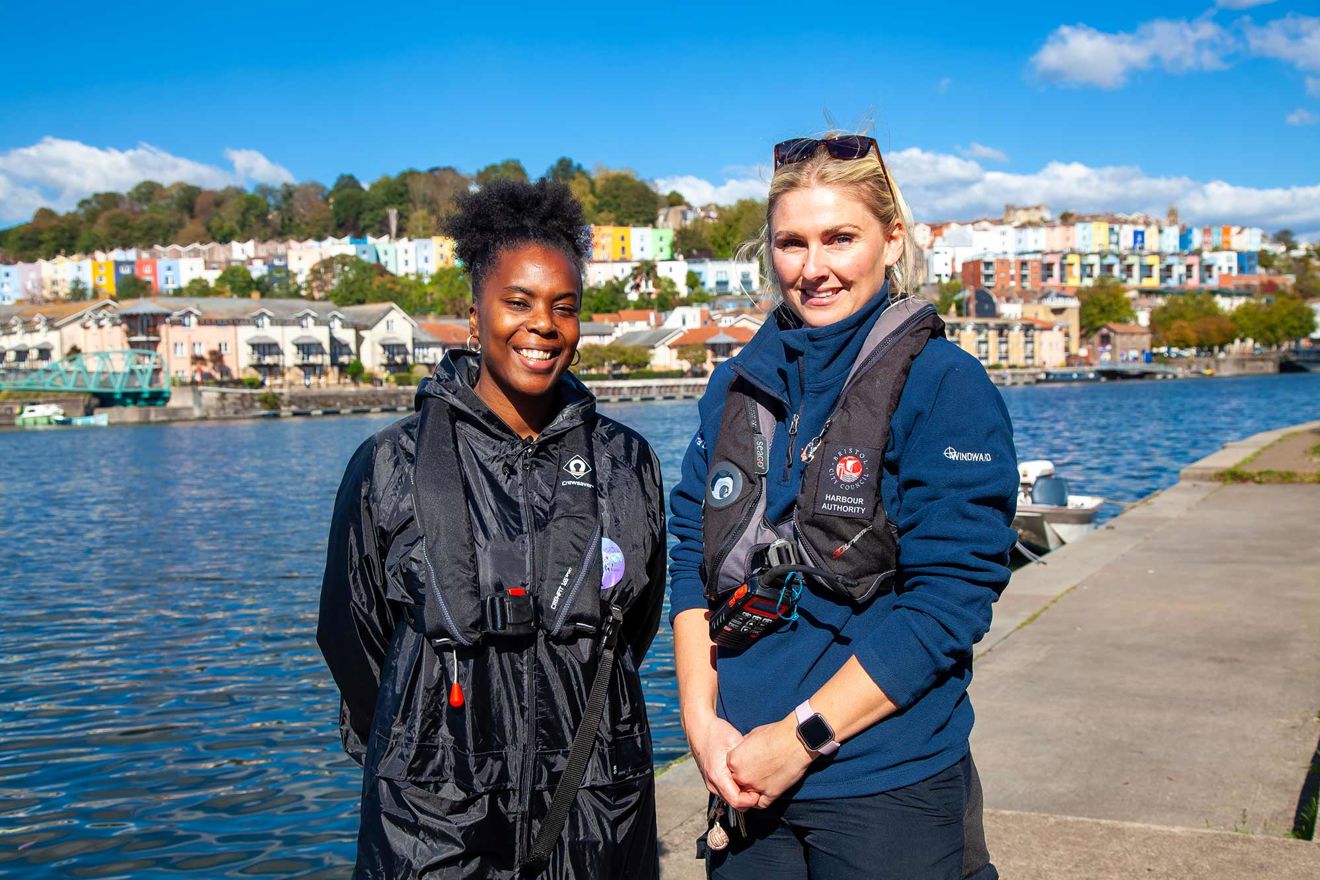Mid shot of two smiling sailors
