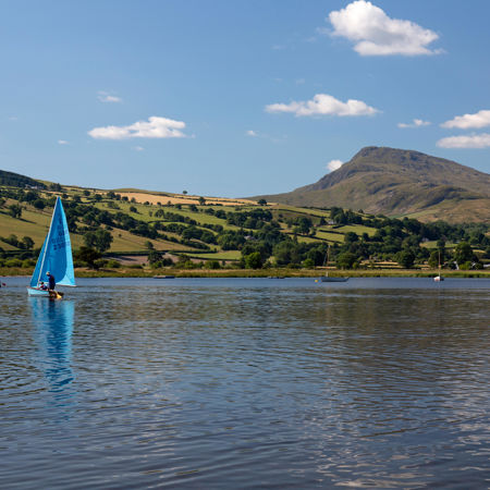 Dinghy sailing near idyllic waters