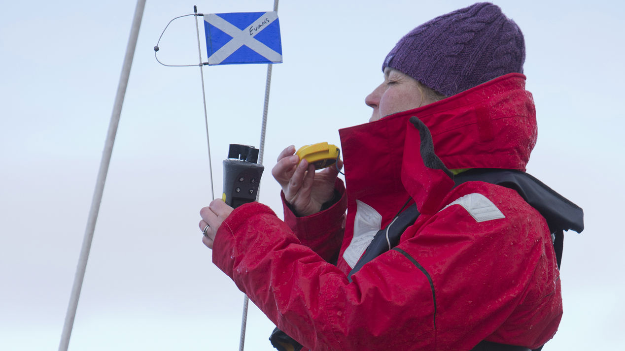 	A race officer marking the angle of the wind